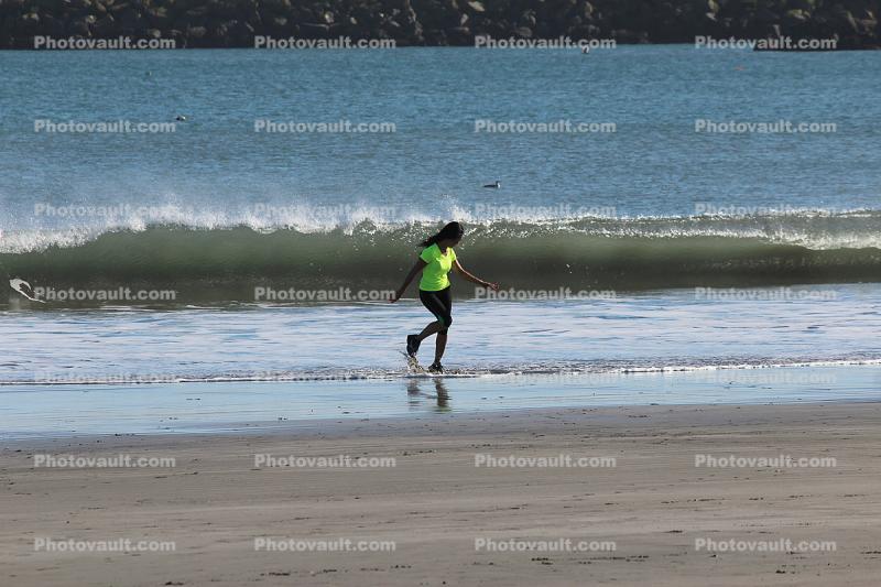 Girl Running from a Wave, Doran Beach