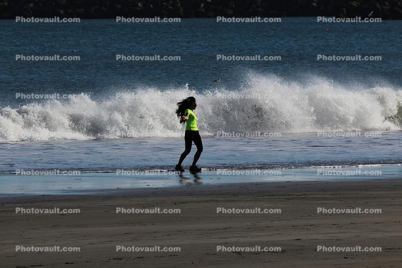 Girl Running at Doran Beach, Wave Splash