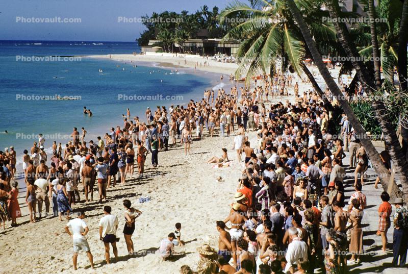 crowds, beach, sand, over population, ocean, water, mass humanity, 1950s