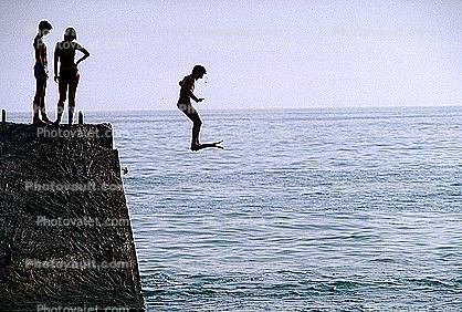 Boy Jumping with swim fins, Sochi Russia, 1980s