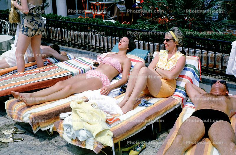 Lounging Ladies and Man, towels, March 1965, 1960s
