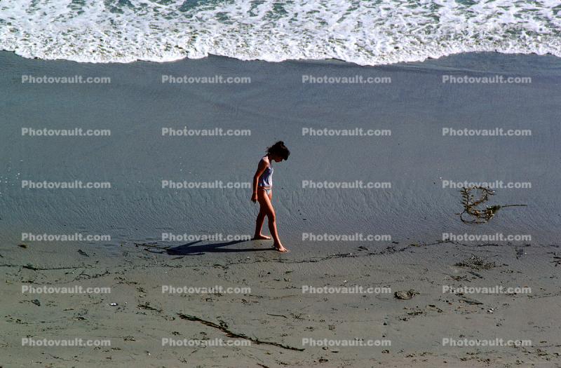 Lone Girl on the Beach