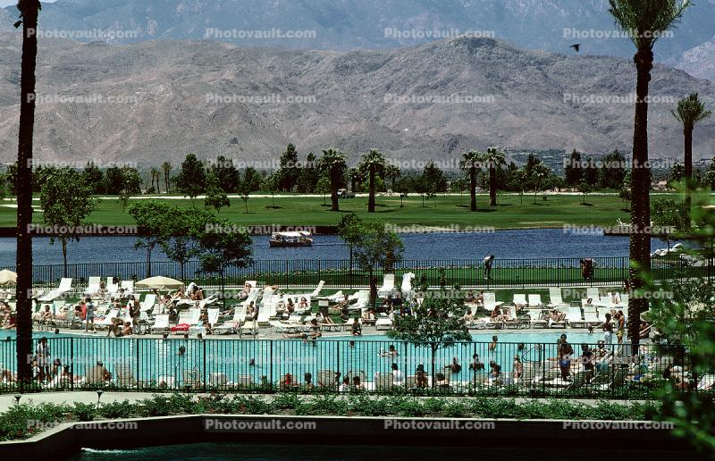 Desert Moutains over a Pool and Lake, Hotel