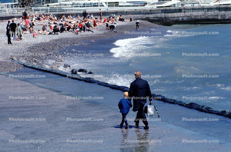 Man and Boy walking together, Black Sea, Beach, Water, Yalta, Crimea, May 1971