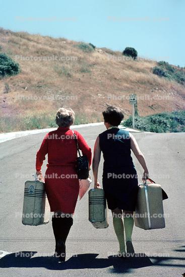 Ladies with Luggage, walking