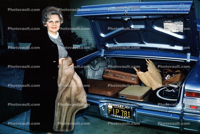 Woman with a Fur Coat, car trunk, bags, baggage, luggage, suitcase, 1965, 1960s