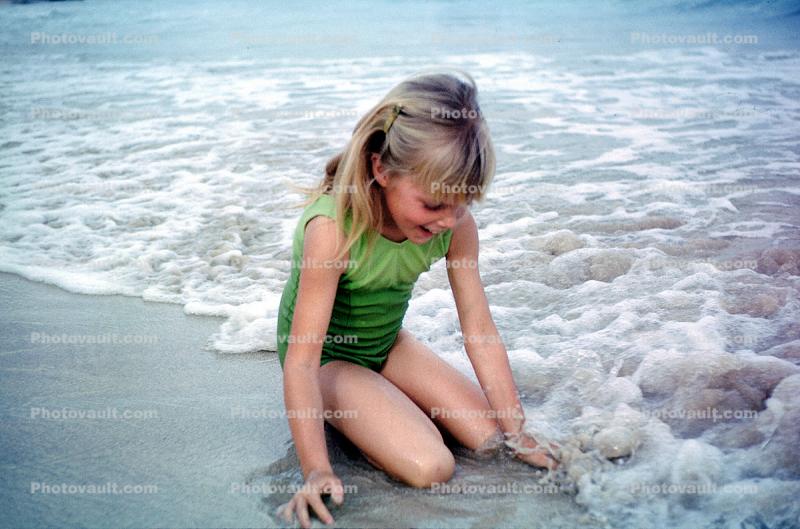 Girl Playing in the sand