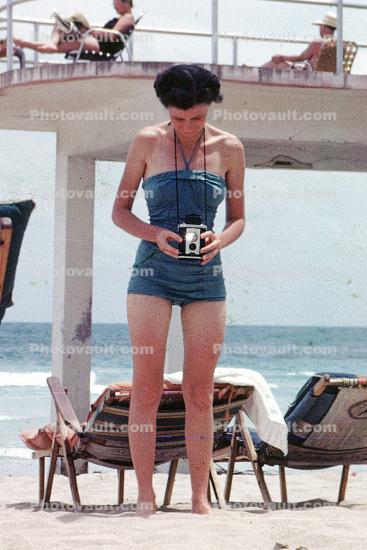 taking a picture, kodak brownie, Brownie Camera, Beach, Ocean, Woman, Deck, Chairs, 1950s, Sand