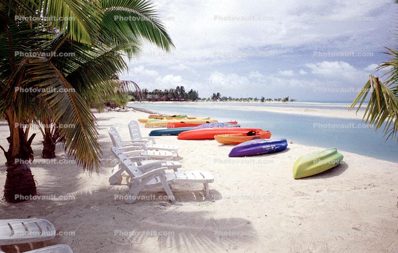 beach, sand sun, ocean, water, palm trees, lounge chairs, Aitutaki, Cook Islands