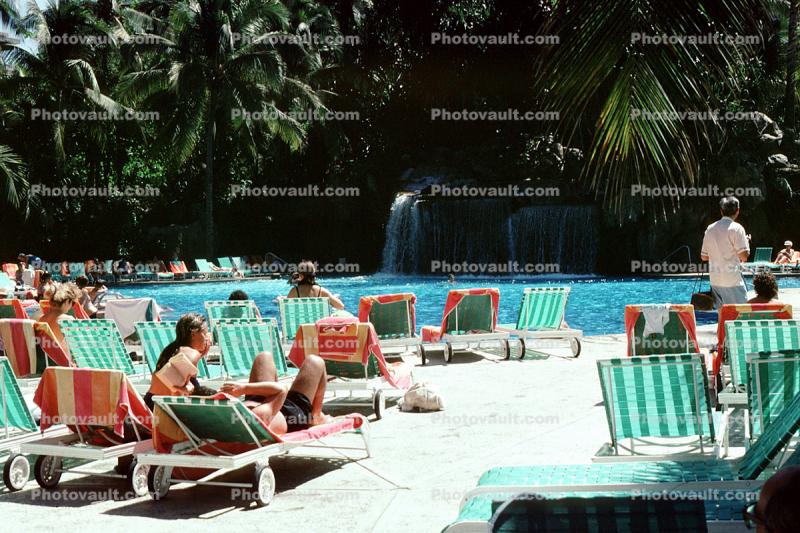poolside, lounge chairs, waterfall, trees, sunshine, Acapulco Princess Hotel