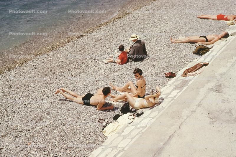 Beach, Sand, Women Sunning, bikini, sun worshiper, 1970s
