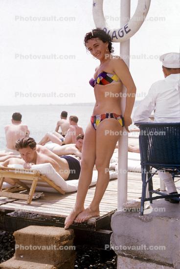 Woman, swimsuit, bikini, 1960s, Women Sunning, Beach, Sand, sun worshiper, 1970s