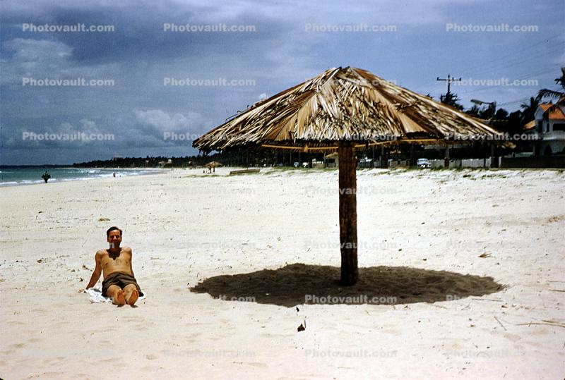 Beach, Sand, Ocean, Parasol, thatched roof, Recife, Brazil, 1950s, Sod