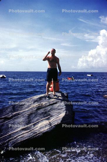 man, male, ocean, rock, 1950s