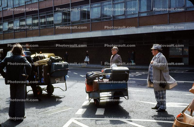 Luggage, Baggage, Men, Suits, Hat, Windy, Cart, May 1971, 1970s