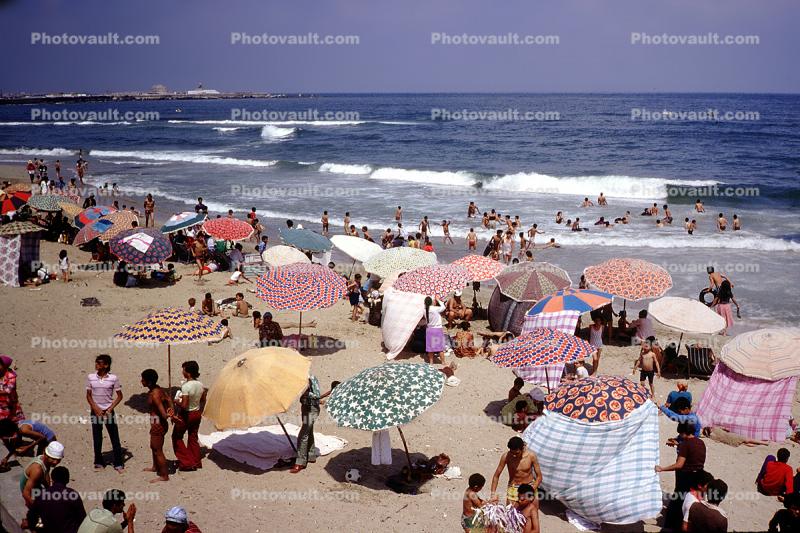 umbrella, parasol, beach, sand, water, party, waves, sunny day, 1960s
