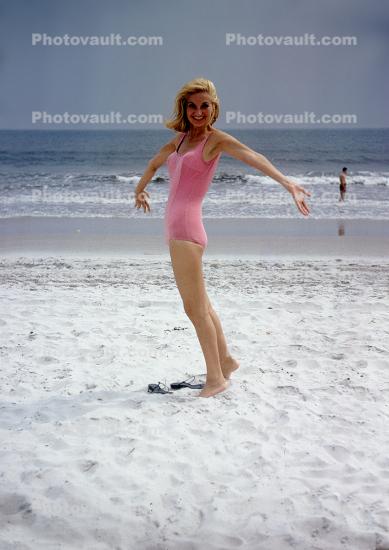 Pink aio, beach, sand, ocean, 1960s