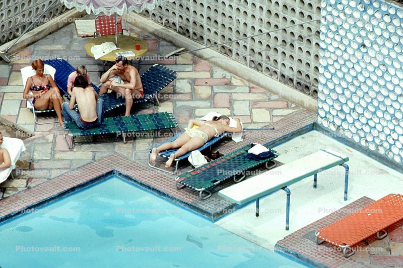Poolside, Furniture, Patio, lounge chairs, women, men, sunning, 1973, 1970s