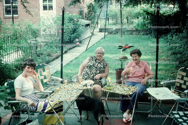 housewife, backyard, sitting, chairs, TV-Trays, 1960s