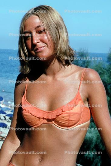 woman getting a nice suntan, sun worshipper, swimmwear, 1970s