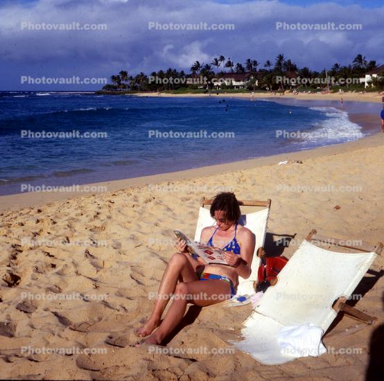 Lounging on the beach, Chair, Sand, ocean, swimsuit, Women, 1960s