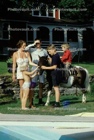 Backyard Horse ride, 1950s