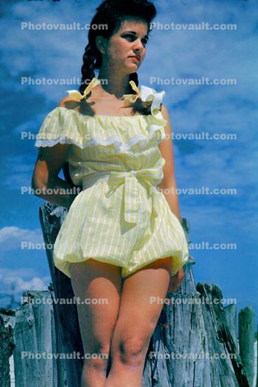 Woman wearing a poofy outfit, fashion, beachwear, 1940s