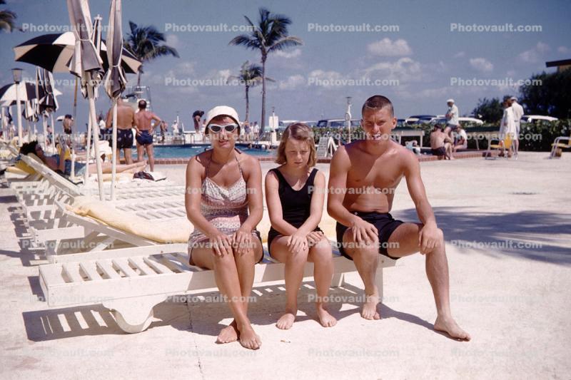 Woman, Girl, Man, swimsuits, trunks, legs, barefoot, bare feet, cateye glasses, Gulf Ocean Mile Hotel, Fort Lauderdale, 1960s