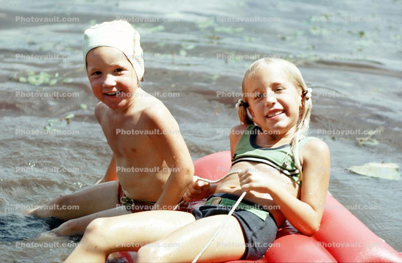 Smiling Girl and Boy, wet, air mattress, Swimsuit, 1960s