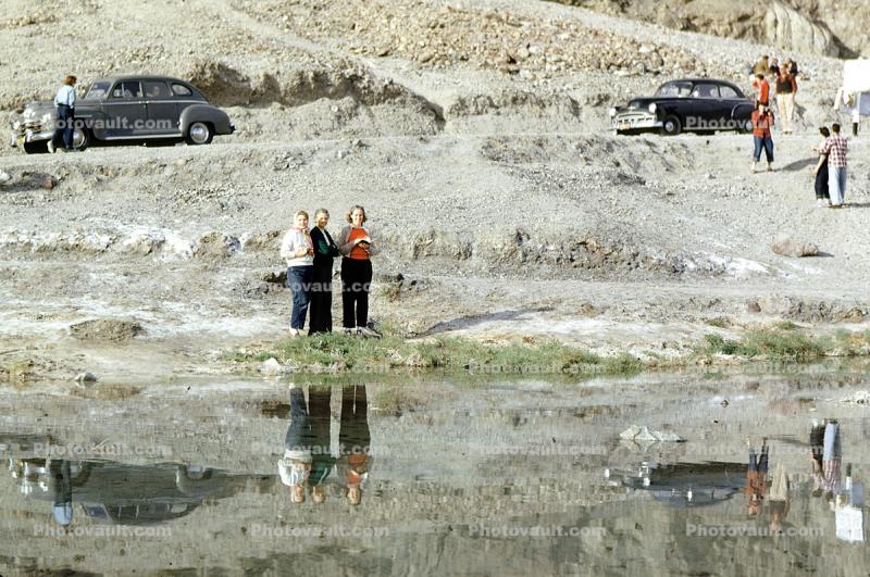 Cars in Death Valley, pond, women, reflection, 1950s
