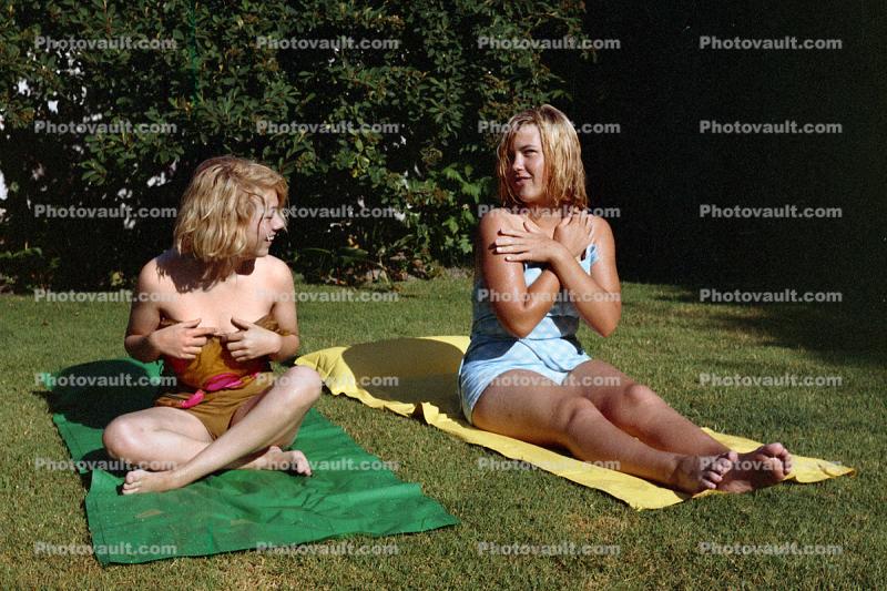Girls having fun, backyard, 1960s