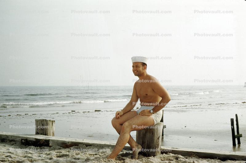 Man in Swim Trunks, hat, beach, Atlantic, Ocean City Maryland, 1950s