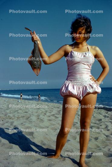 Girl with a Guitarfish catch, bathing suit, 1950s