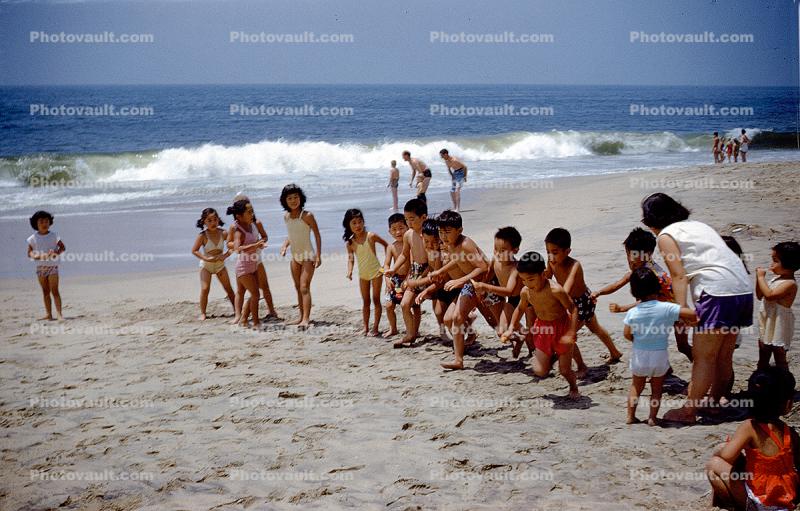 Children playing on the Beach, waves, Ocean