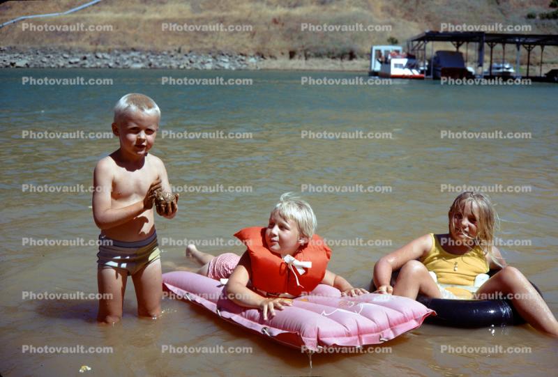 Boy, Girls, Raft, Lake, Life Preserver, 1960s