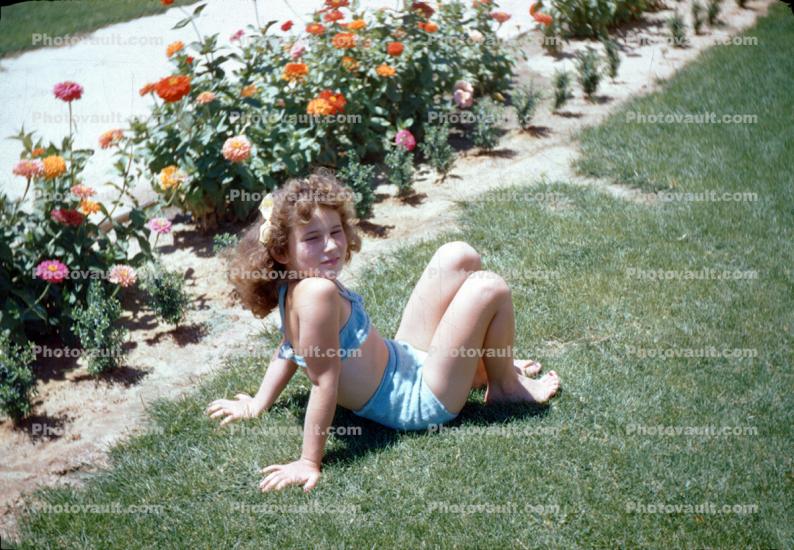 Darleen Resting near Flowers, Oildale California, 1940s