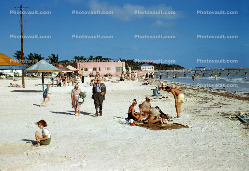 People on the Beach, Buildings, Sand