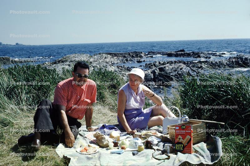 Man, Woman, picnic along the seashore, ocean, Ritz Crackers, August 1960, 1960s