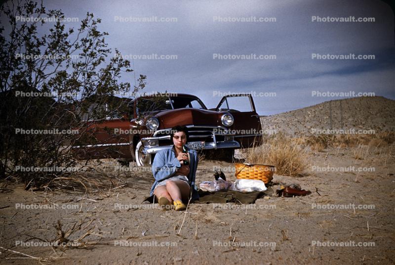 Woman at a Roadside Picnic, Ford Car, 1950s