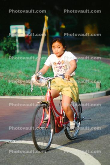 Girl, bicycle
