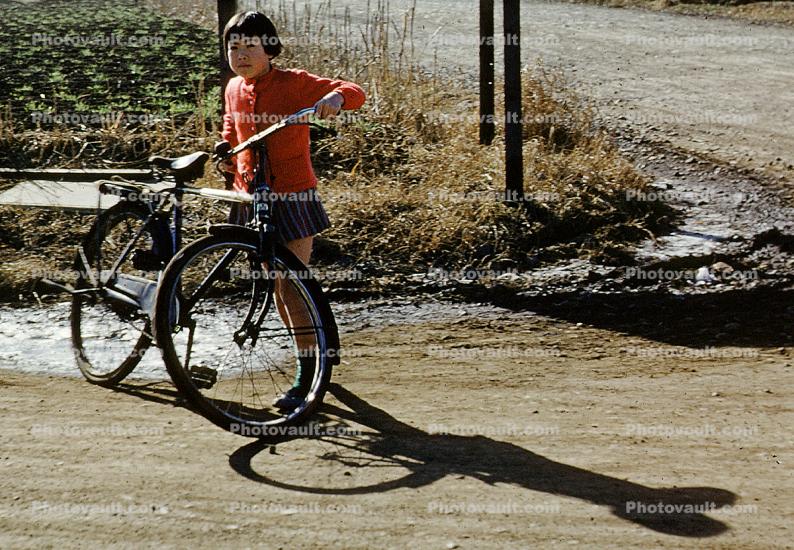 Korean Girl with her Bicycle