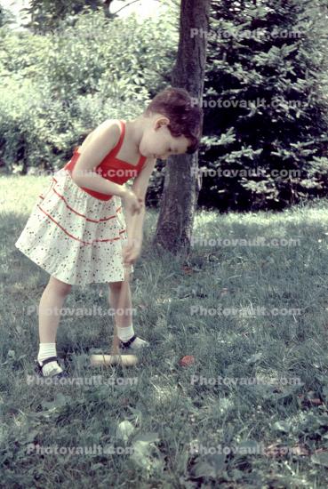 Little Girl Plays Croquet, 1950s