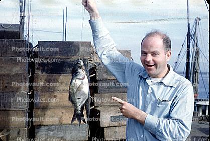 laughing, funny, fun, joking, smile, smiling, fisherman, male, fish catch, 1940s