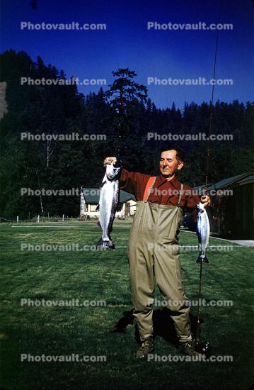 fish catch, man, male, waterproof fishing pants, Rouge River, Oregon, 1952, 1950s