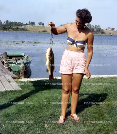 fish catch, Woman, Boat, pink pants, legs, knees, shoes, bra, fashion, 1950s