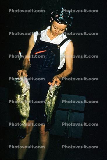 fish catch, Woman, hair curlers, rollers, overalls, 1963, 1960s