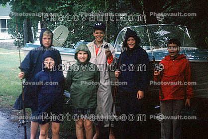 boys, boat, raincoats, group portrait, Cape Cod, Massachusetts, 1963, 1960s
