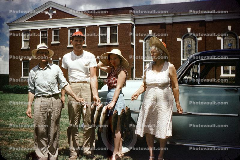 Men, Women, fish catch, home, house, building, 1950s