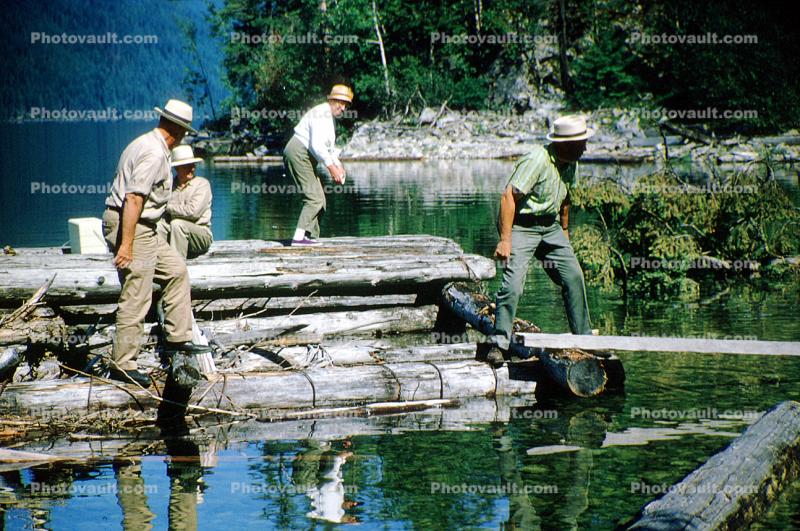 Wooden Raft, lake, forest, trees, men, hats, 1965, 1960s