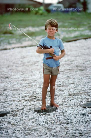 Boy with a Fishing Rod, barefoot